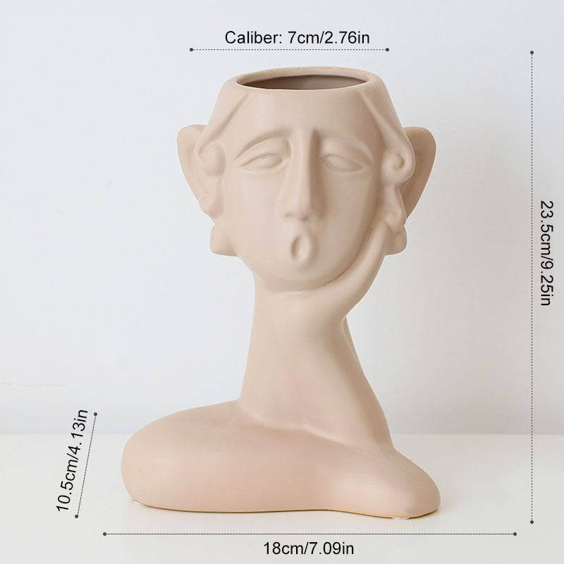 Ceramic face vase decoration