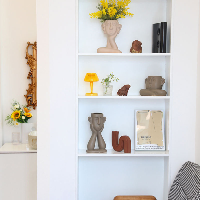Ceramic face vase decoration